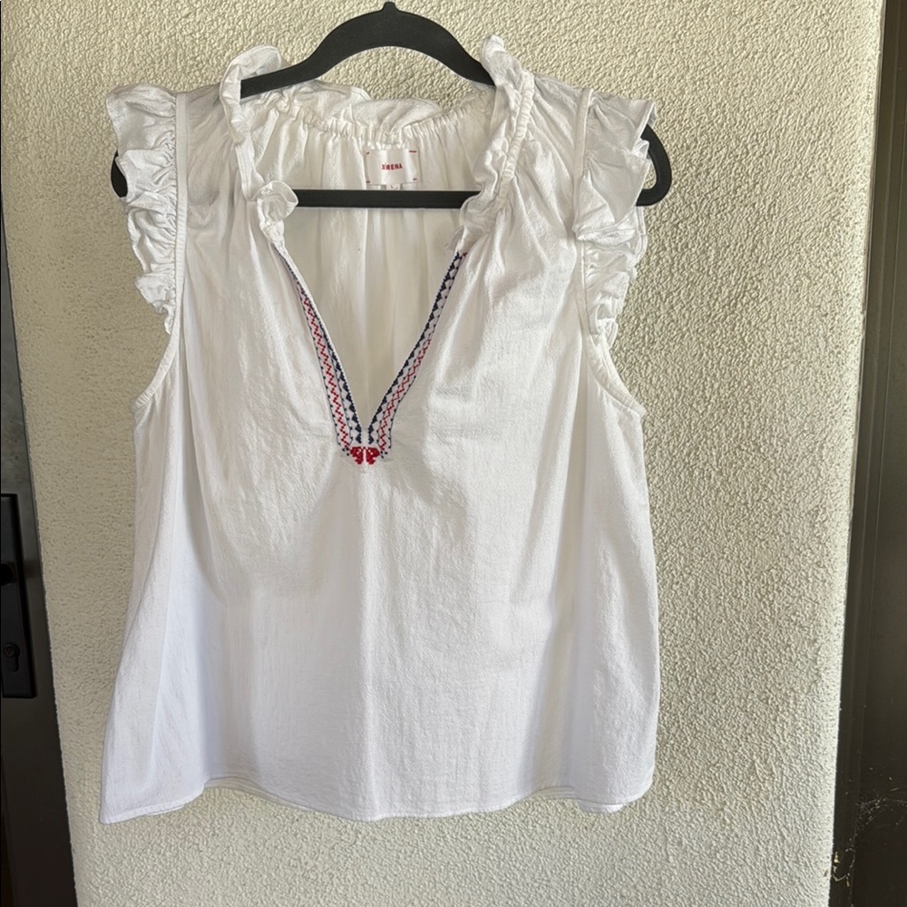 Rare XiRENA Elyza top. Sz L. White Ruffled Blouse with Embroidered Trim